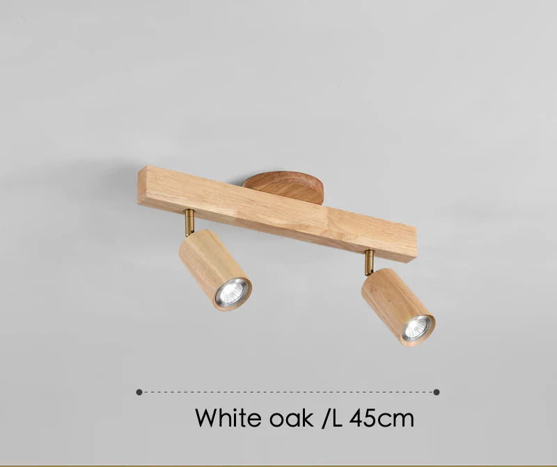 Spot orientable scandinave bois clair fixé sur rail