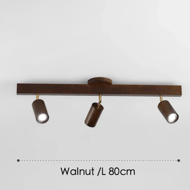 Spot orientable scandinave bois clair fixé sur rail