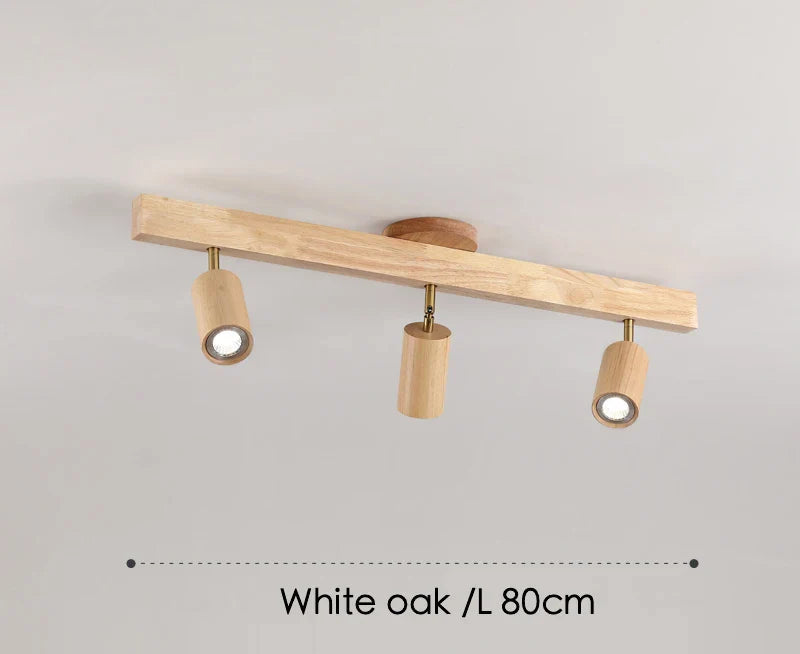 Spot orientable scandinave bois clair fixé sur rail